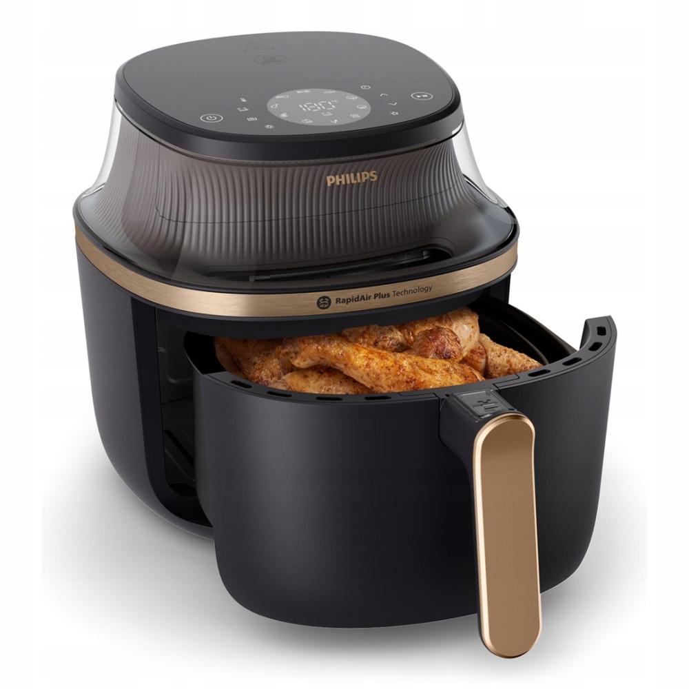Philips 3000 Series NA332/00 - az airfryer betekintőablaka működés közben, amint épp ropogósra sül benne a csirke